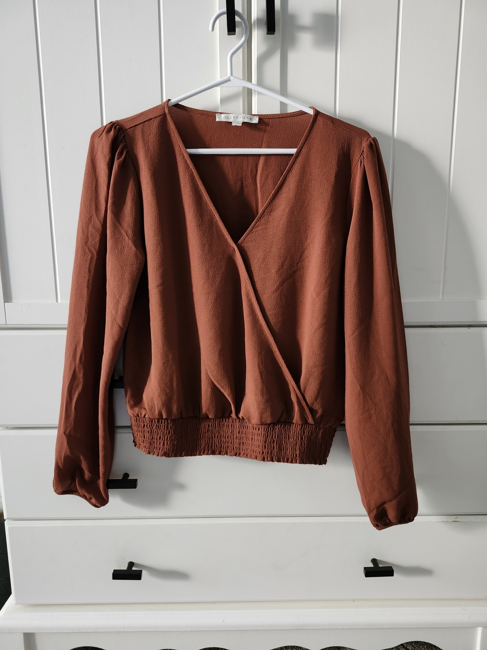 Olive + Oak Rust Wrap-Front Blouse with Smocked Hem. Great For Fall!